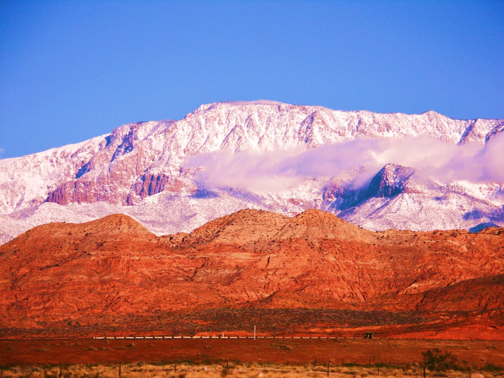 Pine Valley Mountain rising above the red cliffs of southwestern Utah